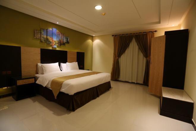 Aparthotel Tulip Al Rawdah Riad Habitación foto